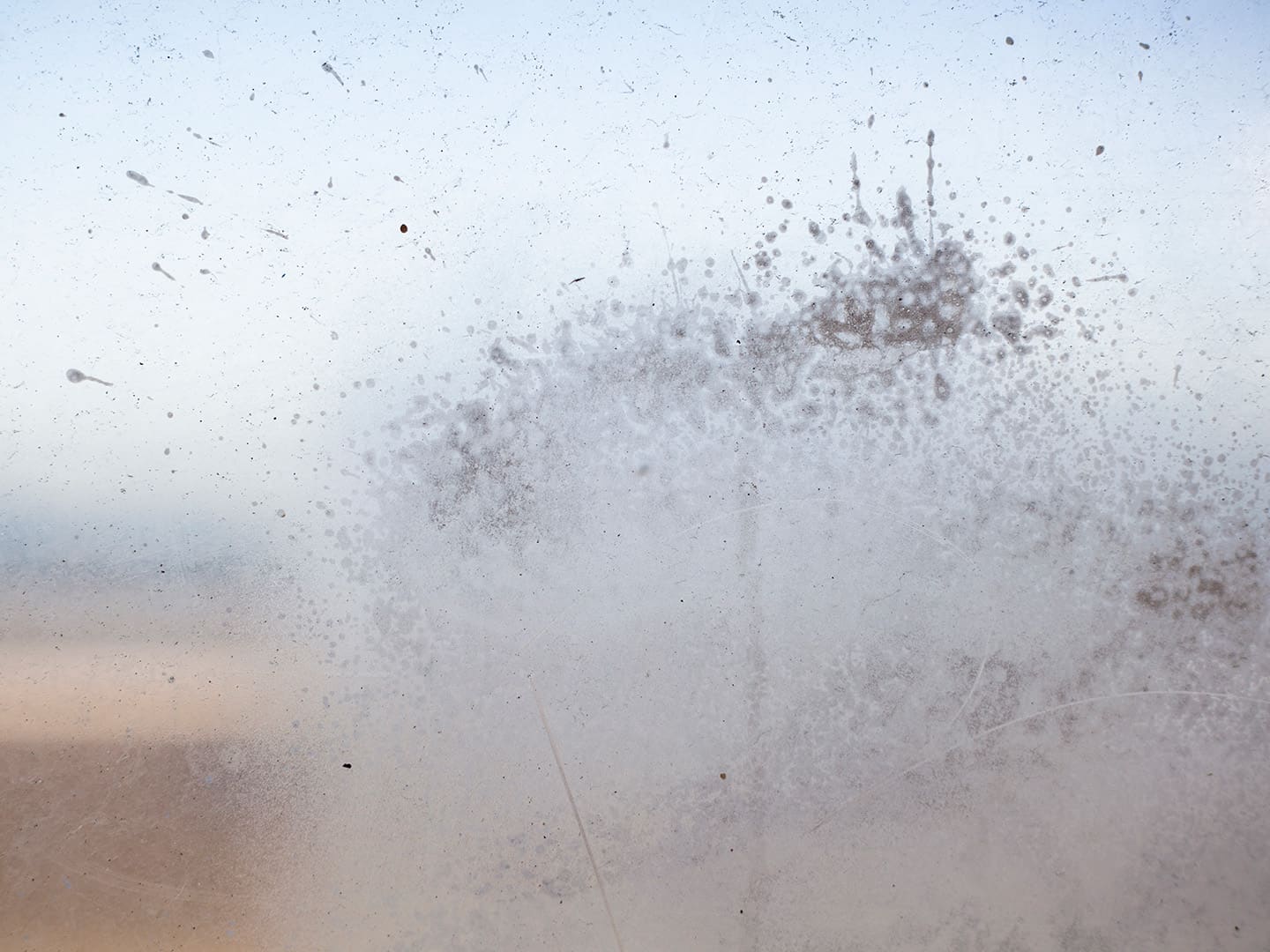 Glass window in seaside shelter, Redcar