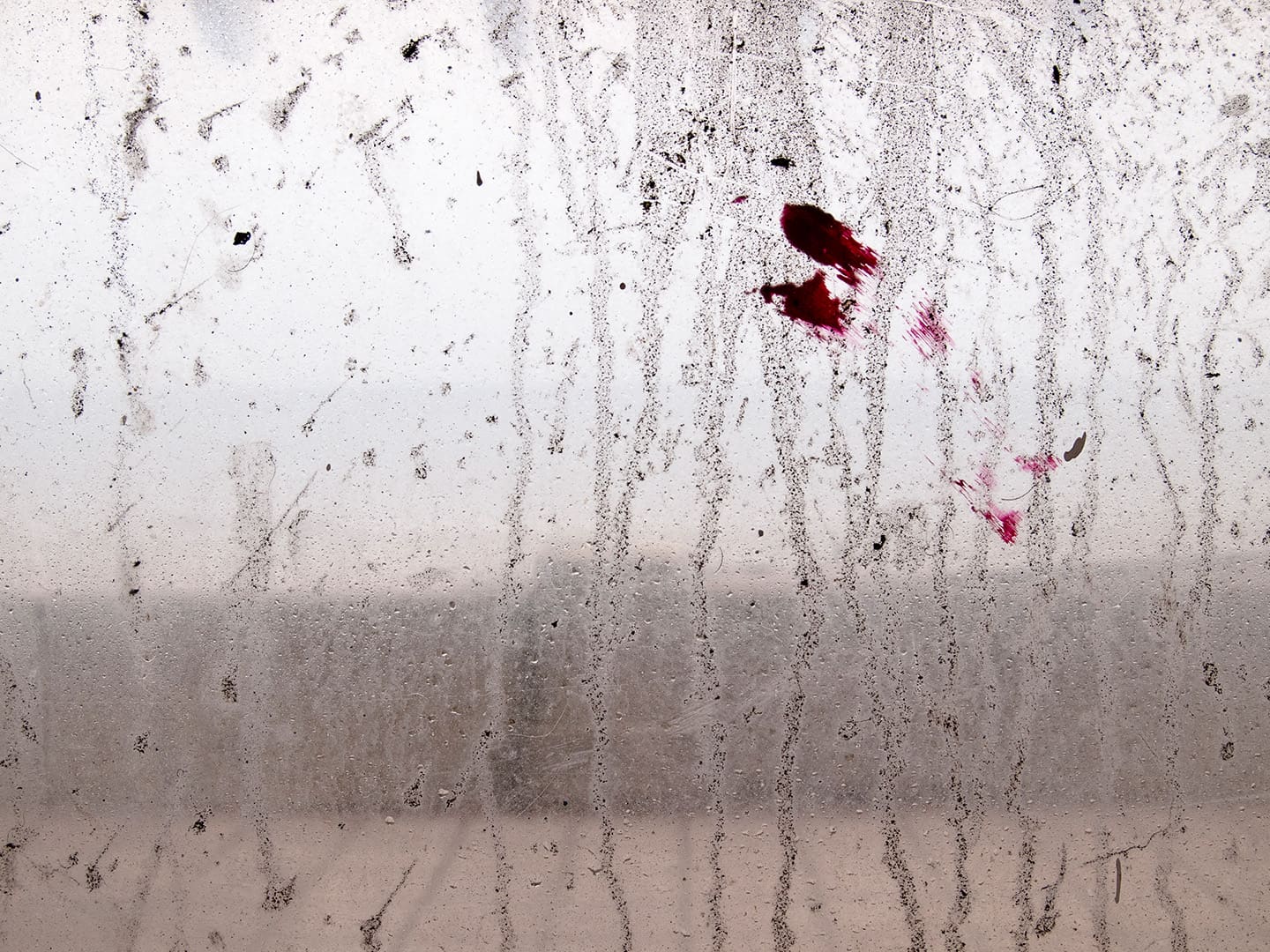 Glass window in seaside shelter, Redcar