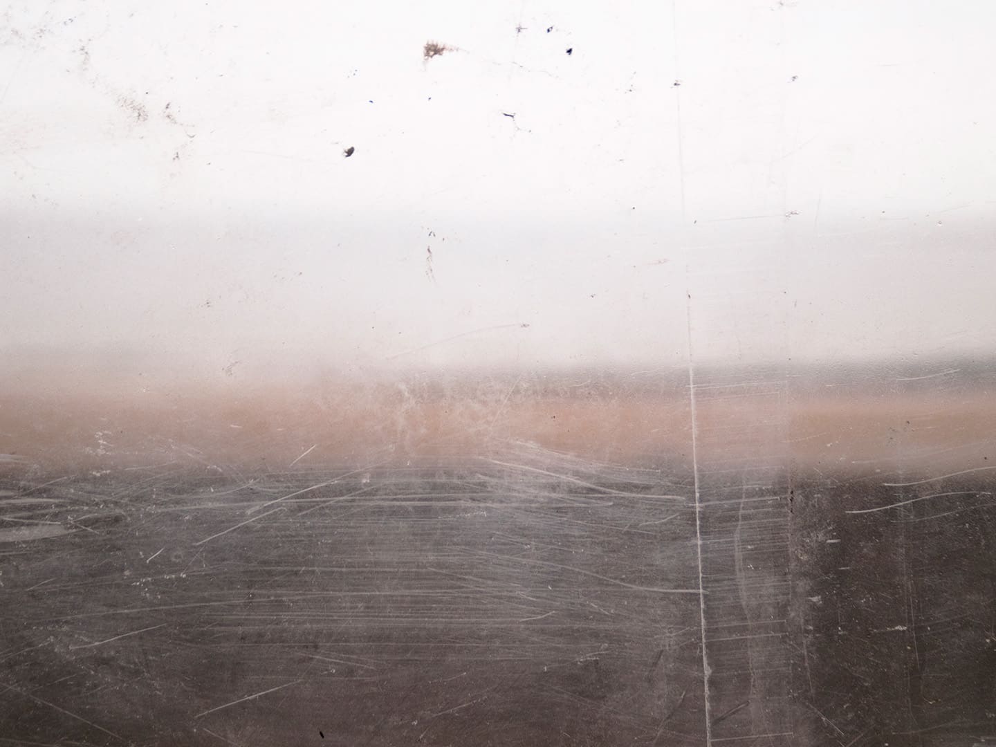 Glass window in seaside shelter, Redcar